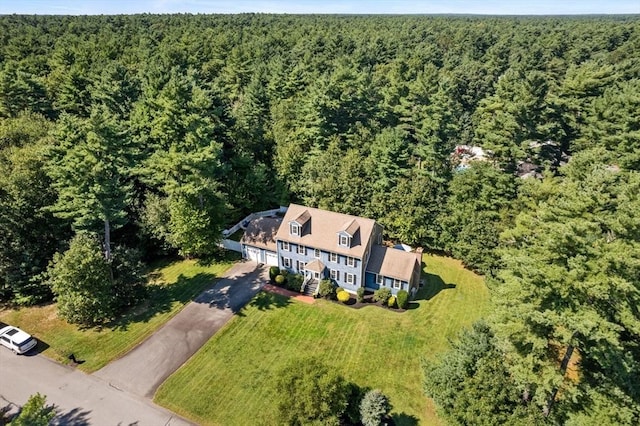 aerial view featuring a view of trees