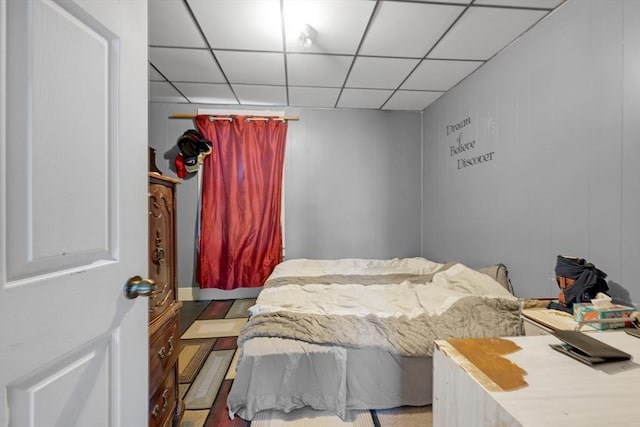 bedroom featuring a drop ceiling