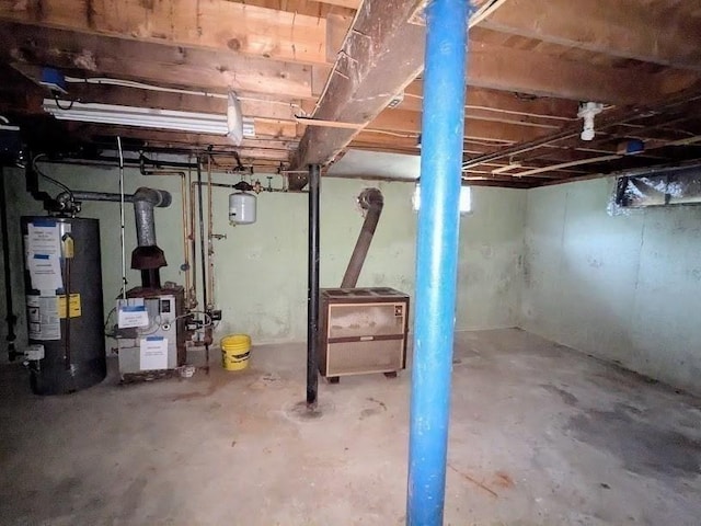 14 Reagan Rd, Townsend, MA 01469 - unfinished below grade area featuring gas water heater and a heating unit