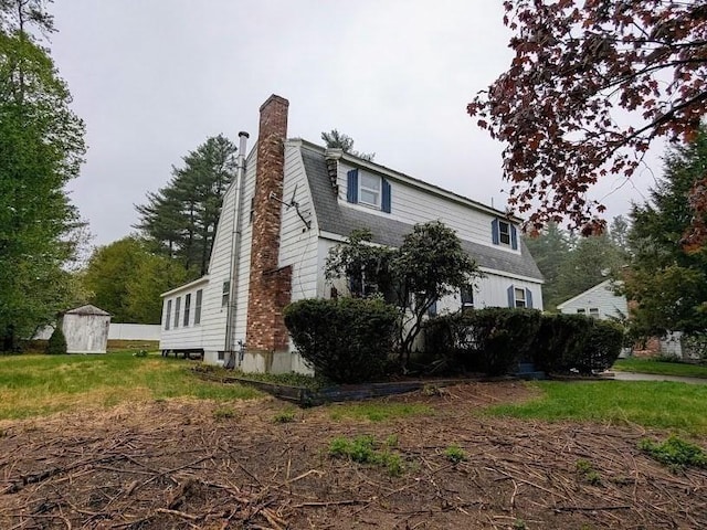 14 Reagan Rd, Townsend, MA 01469 - view of side of home with a chimney