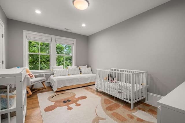 2 Rockwood Ter Unit 2, Newton, MA 02466 - bedroom with recessed lighting and wood finished floors