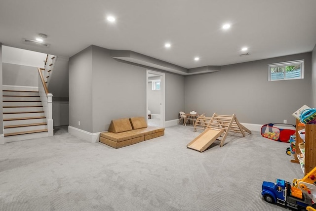 2 Rockwood Ter Unit 2, Newton, MA 02466 - recreation room with recessed lighting, baseboards, carpet, and healthy amount of natural light