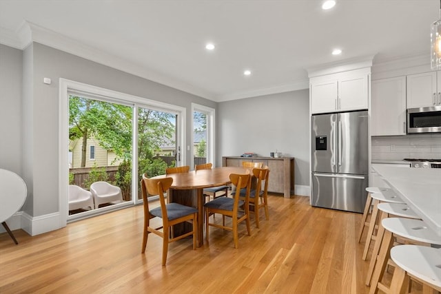 2 Rockwood Ter Unit 2, Newton, MA 02466 - dining space featuring ornamental molding, recessed lighting, light wood-type flooring, and baseboards