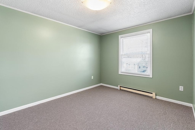 spare room featuring carpet, baseboards, ornamental molding, a textured ceiling, and a baseboard heating unit