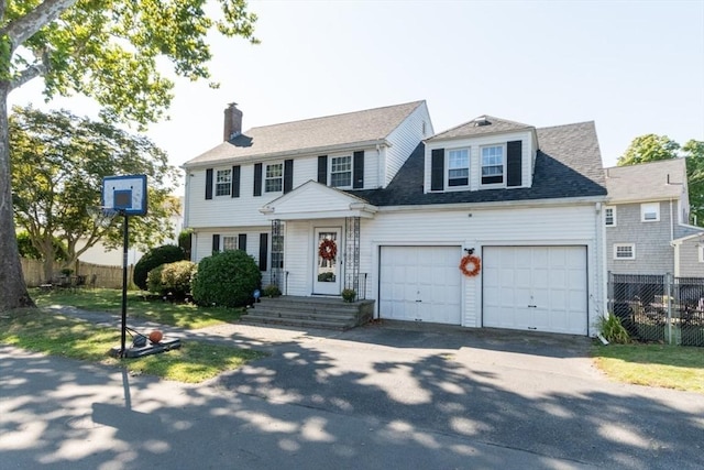 colonial house featuring a garage