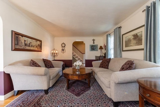 living room featuring crown molding and hardwood / wood-style floors