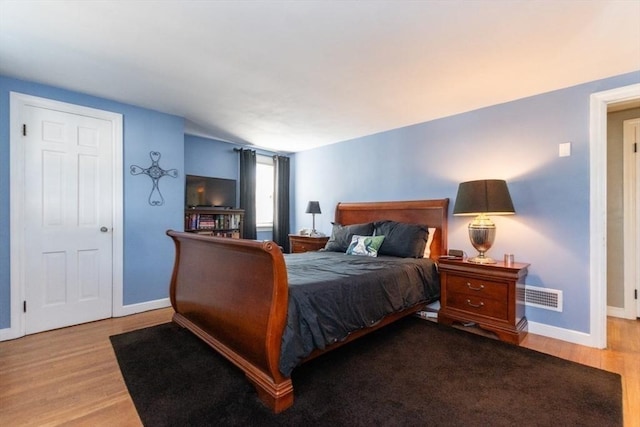 bedroom featuring light hardwood / wood-style flooring