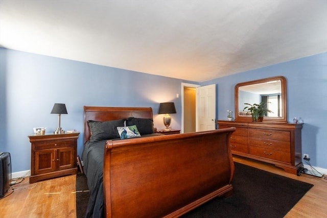 bedroom featuring light wood-type flooring