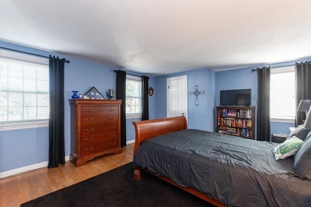 bedroom featuring light wood-type flooring