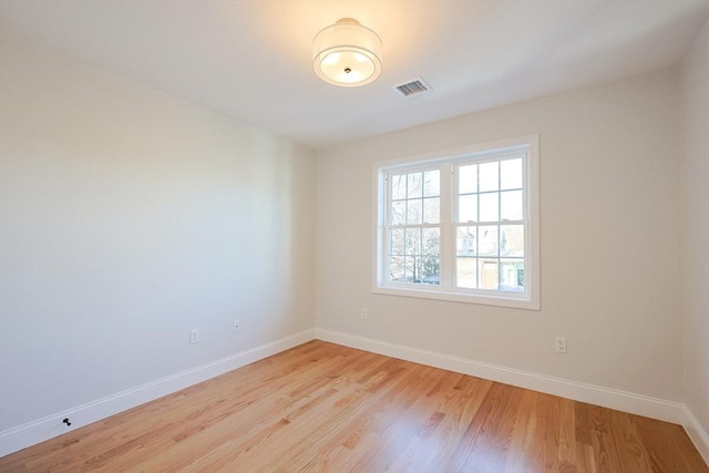 empty room with light wood-type flooring