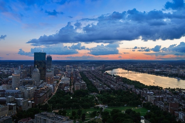 property's view of city with a water view