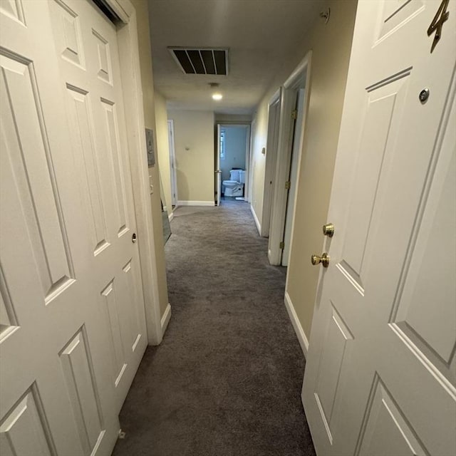 1928 N Main St Unit 4, Fall River, MA 02720 - corridor with dark colored carpet and baseboards