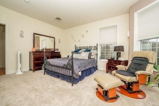 bedroom featuring carpet