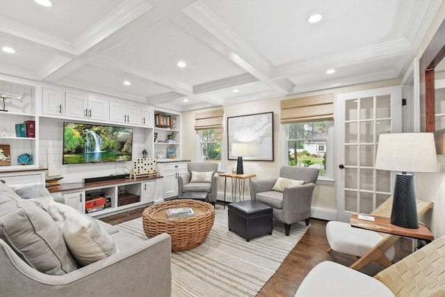 living room with ornamental molding, beam ceiling, coffered ceiling, and light wood-type flooring