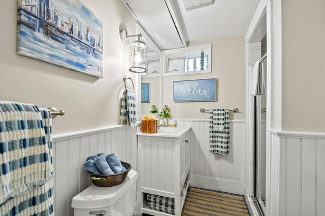 bathroom with vanity, a shower with curtain, and toilet