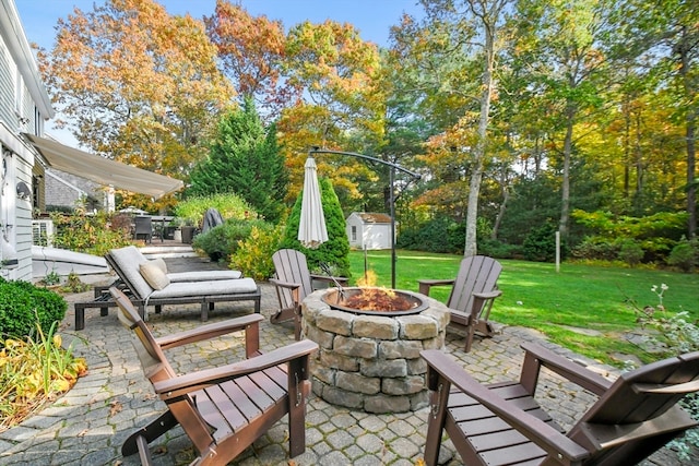 view of patio / terrace with an outdoor fire pit