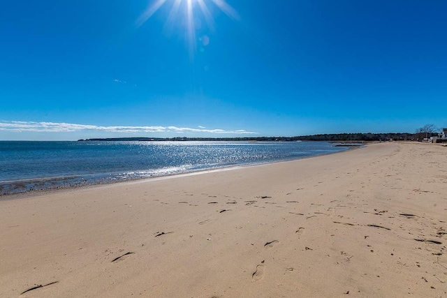 property view of water featuring a beach view