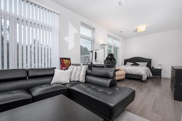 bedroom with hardwood / wood-style flooring