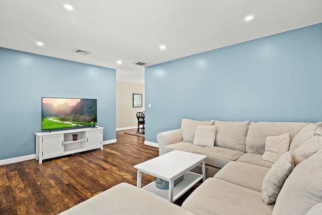 living room featuring dark hardwood / wood-style floors