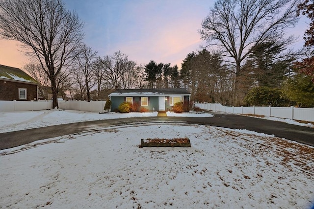 view of yard layered in snow