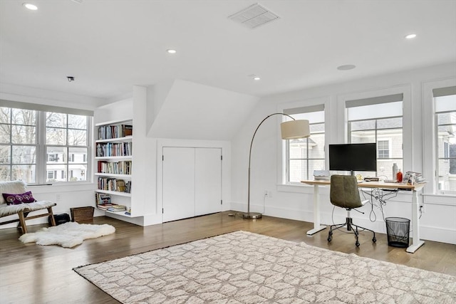 home office featuring recessed lighting, wood finished floors, and visible vents