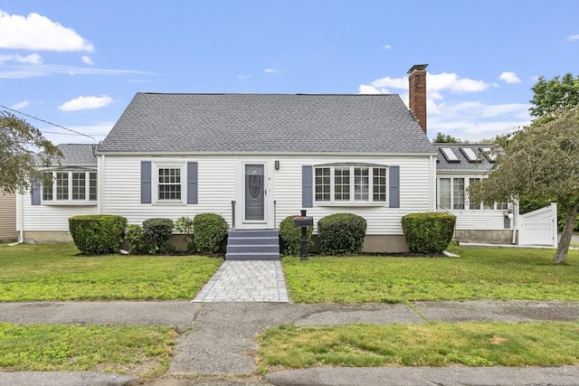 18 Rainbow Cir, Peabody, MA 01960 - cape cod house with a chimney, a front lawn, and a shingled roof