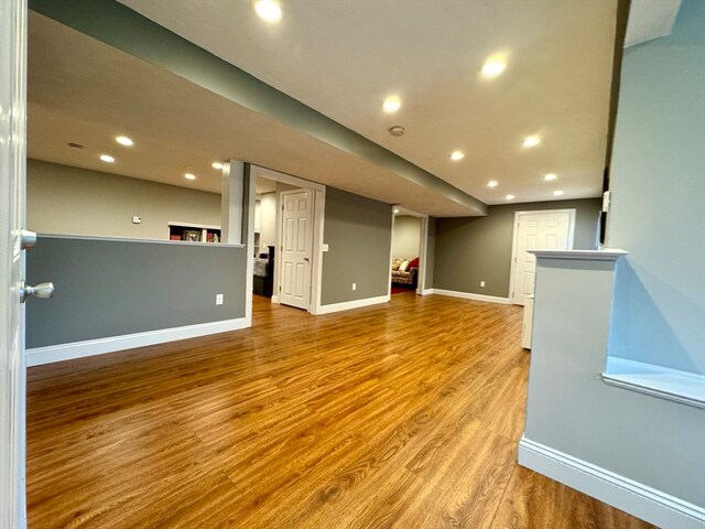 unfurnished living room with light hardwood / wood-style flooring