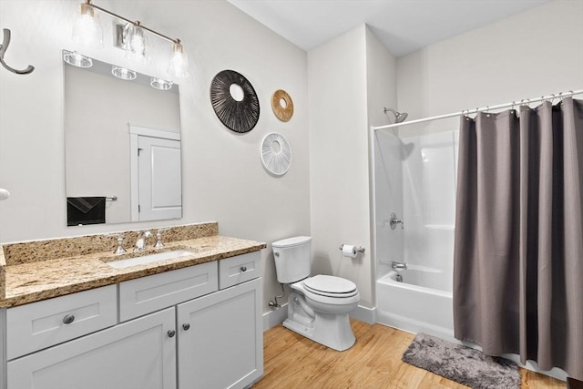 57 Long Point Rd Unit 110, Lakeville, MA 02347 - full bath featuring toilet, wood finished floors, vanity, shower / bath combination with curtain, and baseboards