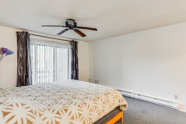 carpeted bedroom with a textured ceiling, a baseboard radiator, and ceiling fan