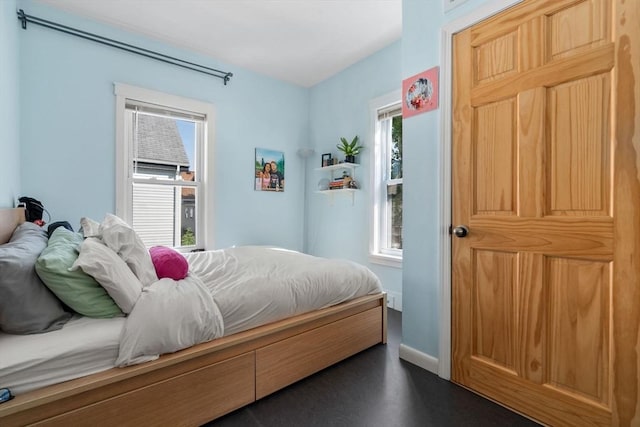 bedroom featuring baseboards