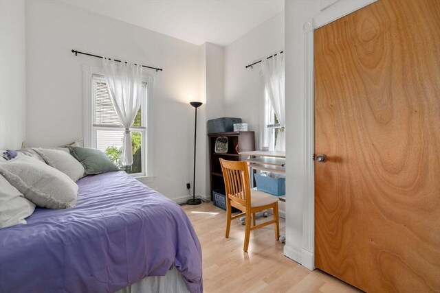 bedroom featuring light wood-type flooring