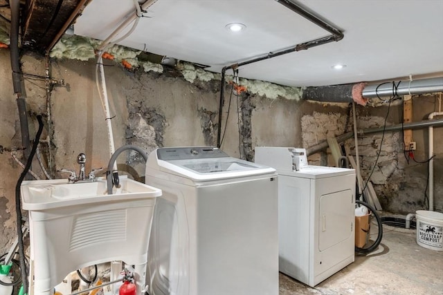 clothes washing area featuring independent washer and dryer and recessed lighting