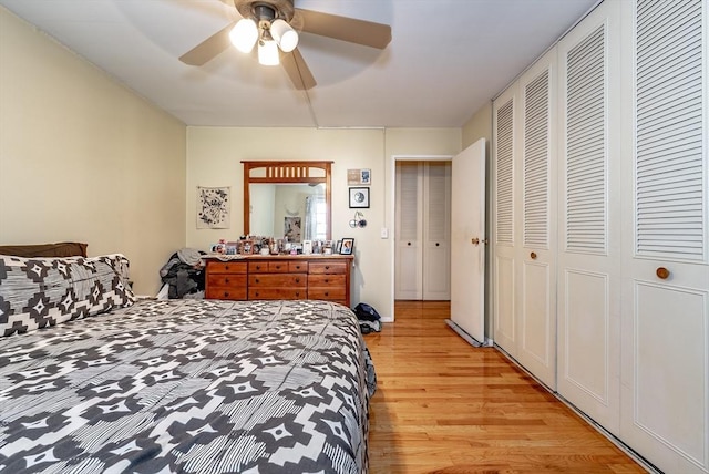 bedroom with light wood-style floors and ceiling fan