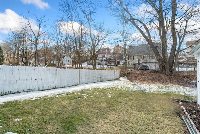 view of yard covered in snow