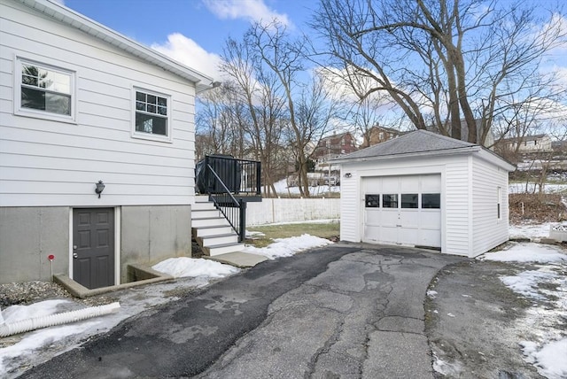 view of snow covered garage