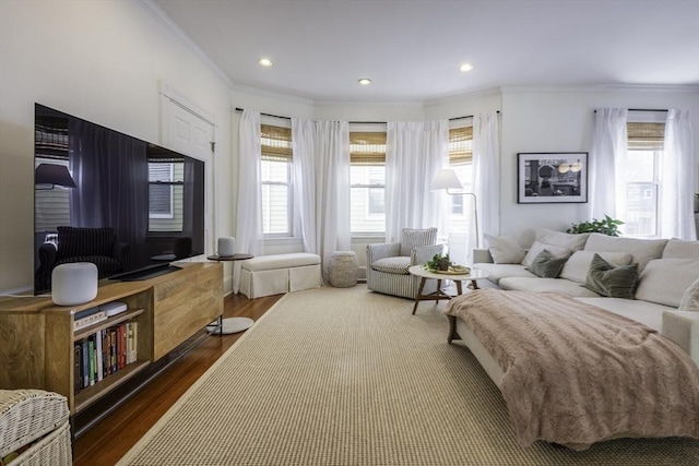 living room with crown molding, dark wood-type flooring, and recessed lighting