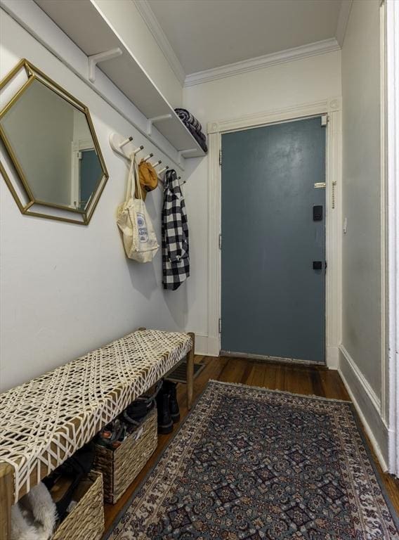 mudroom featuring wood finished floors, crown molding, and baseboards