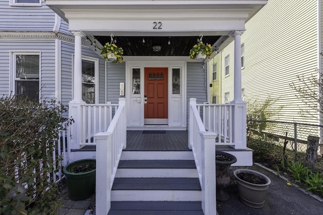 entrance to property featuring covered porch