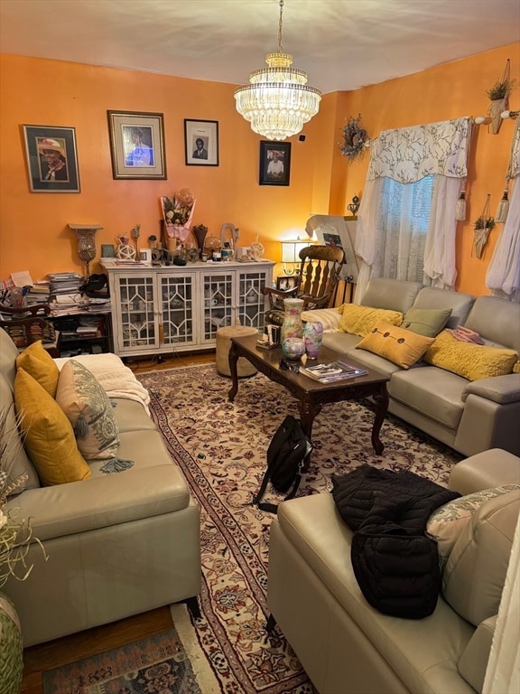 living room with an inviting chandelier