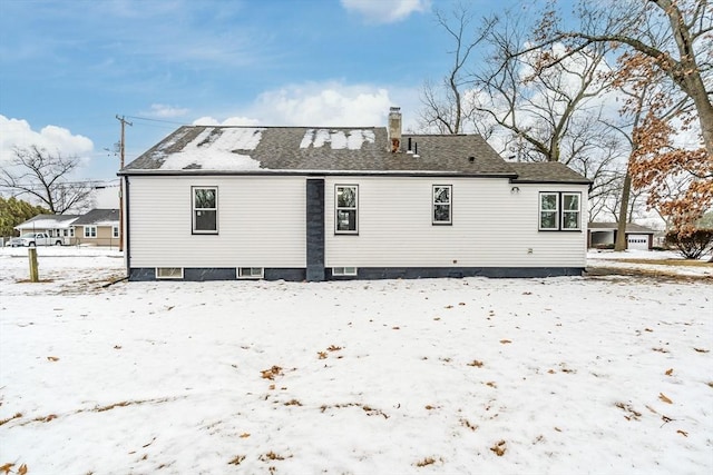 view of snow covered house