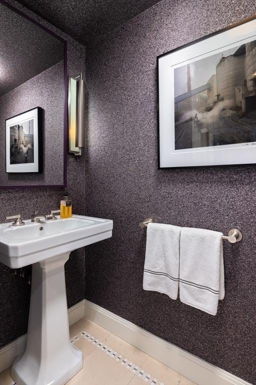 bathroom featuring tile patterned flooring and sink