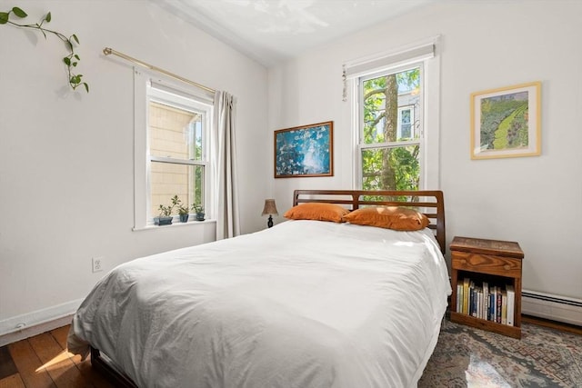 95 Child St Unit 2, Boston, MA 02130 - bedroom with hardwood / wood-style floors, baseboards, and baseboard heating