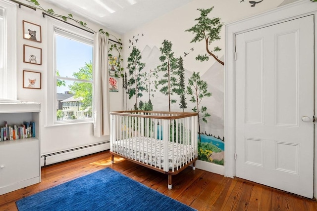 95 Child St Unit 2, Boston, MA 02130 - bedroom with baseboard heating and hardwood / wood-style flooring
