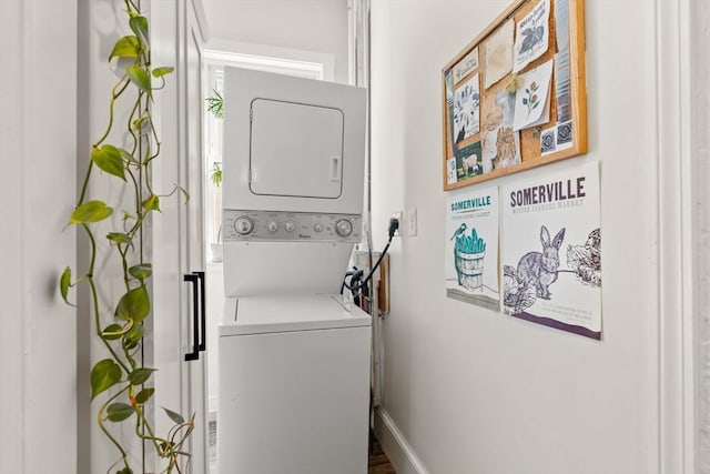 95 Child St Unit 2, Boston, MA 02130 - laundry room with stacked washer / dryer and baseboards