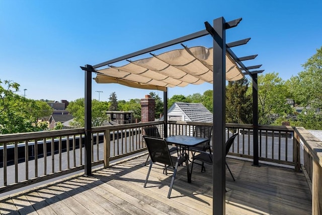 95 Child St Unit 2, Boston, MA 02130 - wooden deck featuring a pergola and outdoor dining space
