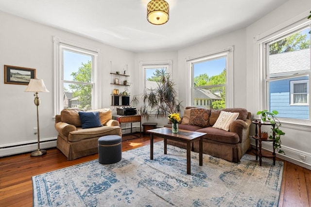 95 Child St Unit 2, Boston, MA 02130 - living area featuring wood finished floors, a baseboard heating unit, baseboard heating, and baseboards