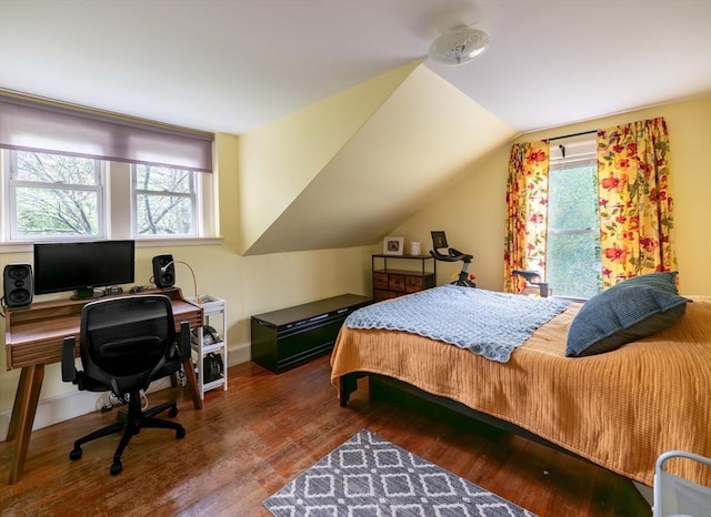303 S St, Northampton, MA 01060 - bedroom featuring wood finished floors, a desk, lofted ceiling, and baseboards