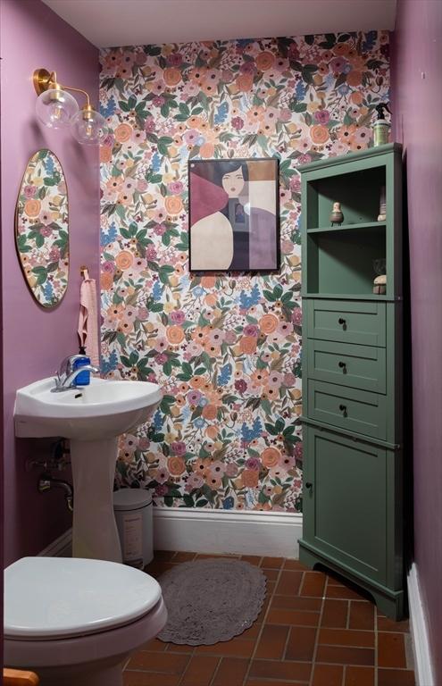 303 S St, Northampton, MA 01060 - half bathroom with wallpapered walls, baseboards, toilet, and tile patterned flooring