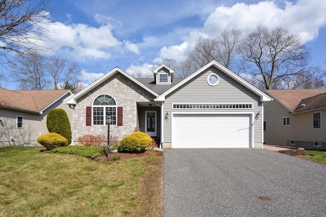 view of front of property with a garage, stone siding, a front lawn, and aphalt driveway