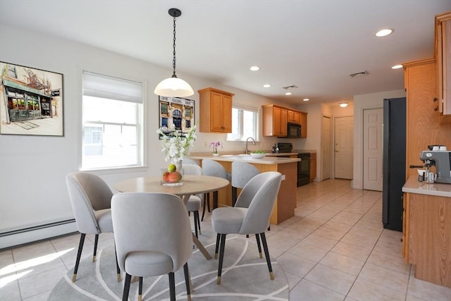 dining room with visible vents, recessed lighting, light tile patterned flooring, and baseboard heating